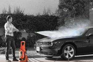 cleaning a car with an electric pressure washer